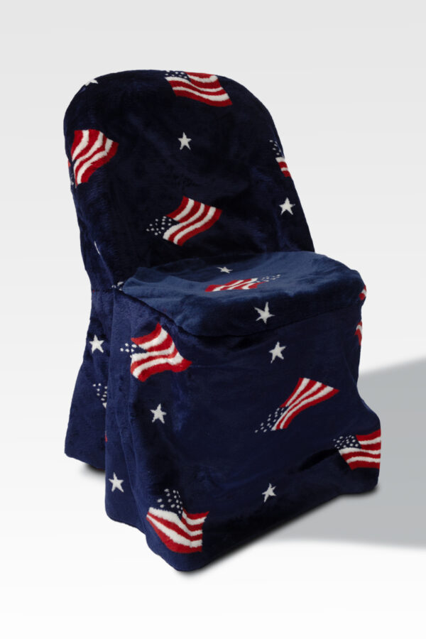 A navy blue chair with plush fabric featuring American flags and white stars adds comfort and charm. Enhance its appeal with stylish Chair Covers for added flair.