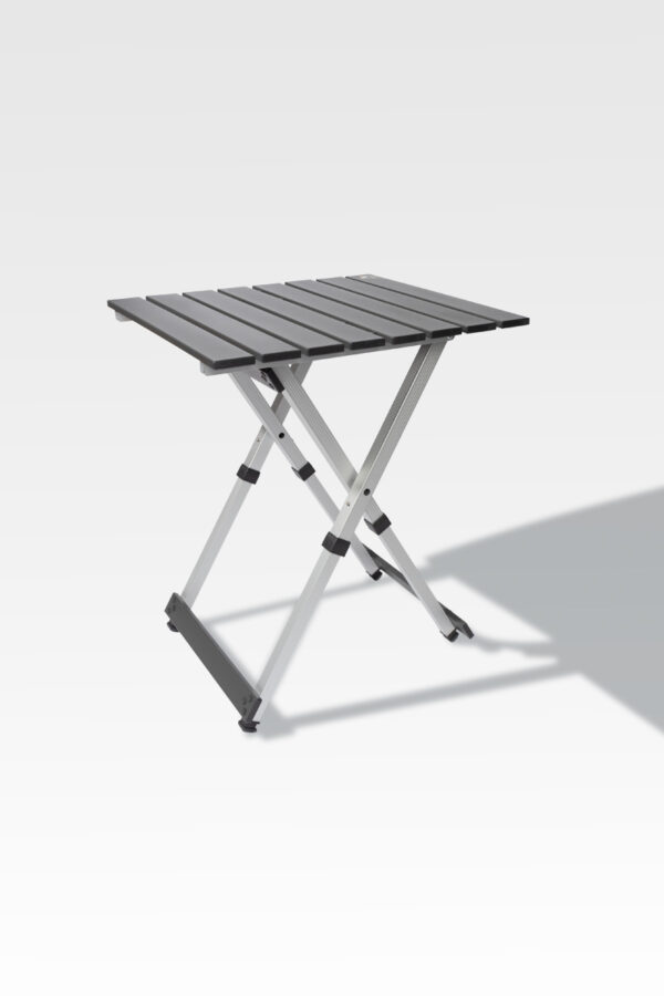The EZ Fold Cremation Stand is a compact, foldable gray metal table with a slatted top and X-shaped legs, displayed on a light gray background.