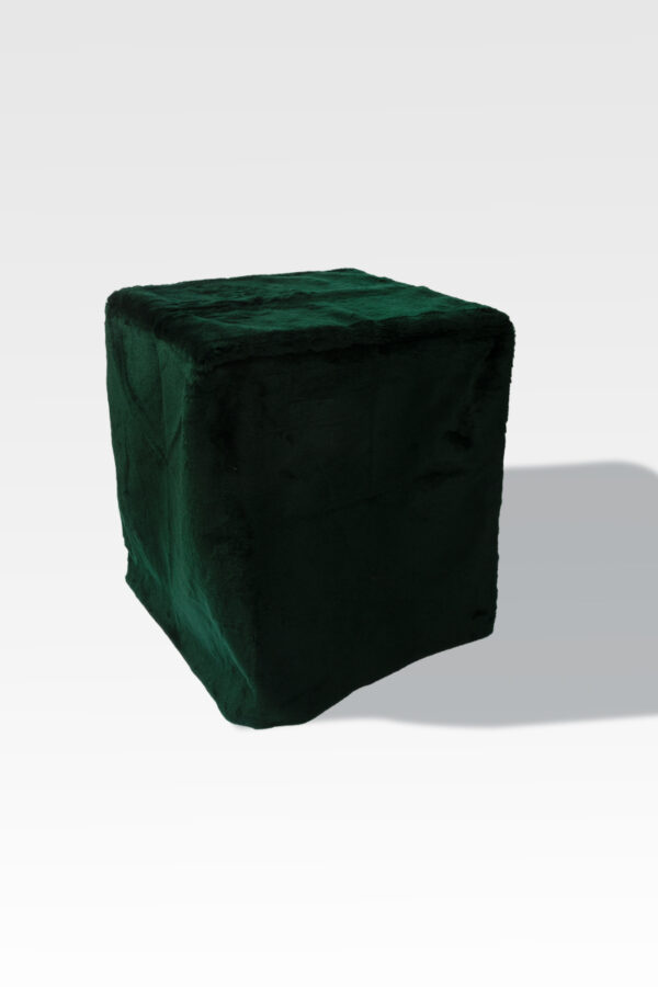 Against a plain white background, the EZ Fold Cremation Stand features a dark green fabric-covered cube shape that stands out.