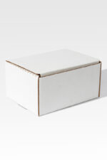 A Cardboard Mailer in a plain white rectangular design sits gracefully against a light gray backdrop.