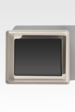 A Cremains Urn Vault, featuring a black rectangular design reminiscent of an urn, is nestled inside a white rectangular tray, viewed from above against a light gray background.