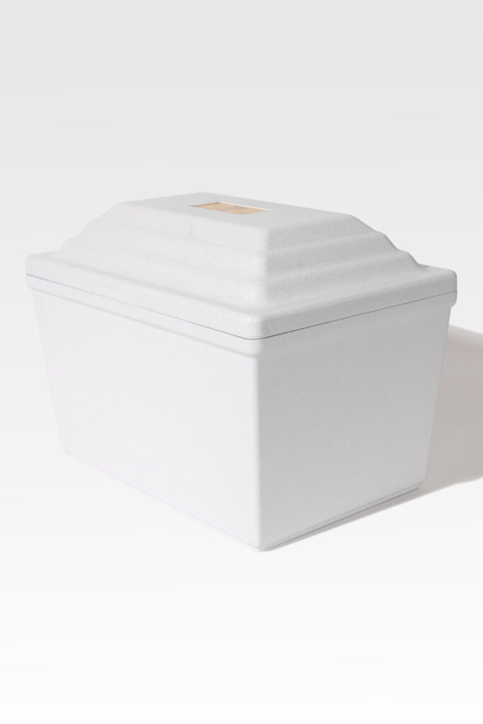 The Fortress® Urn Vault exudes elegance with its white rectangular cooler design, complemented by a textured lid and an elegant gold label on top.