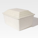 A rectangular, textured white styrofoam cooler with a raised lid, reminiscent of the robust design seen in the Safeguard® Urn Vault.