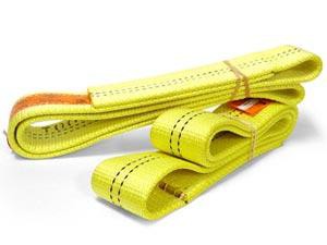 Two yellow tow straps with black stitching, coiled and secured with brown bands, placed side by side.