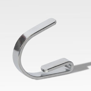 A silver metal clip shaped like the letter "C" is displayed upright against a plain, light gray background.
