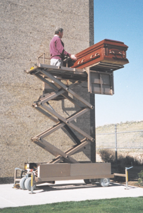 Low Boy mausoleum lift for crypt placement.